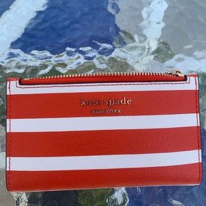 - Kate Spade ♠️ Stripped Orange and White Tamarillo Wallet (NWOT)